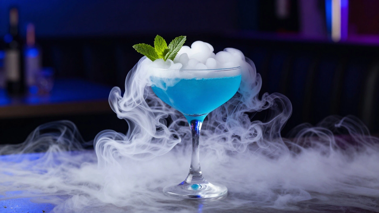 A bright blue mocktail with dramatic white dry ice fog overflowing the glass